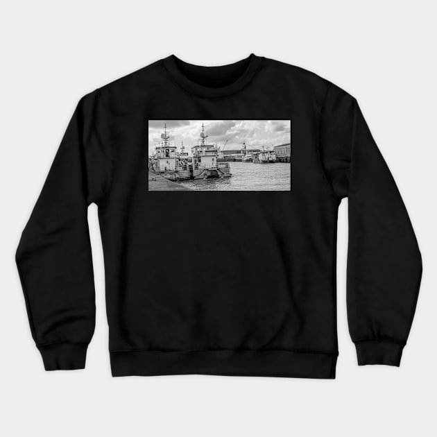 Crew transfer vessels moored up in the docks in the seaside town of Great Yarmouth, Norfolk Crewneck Sweatshirt by yackers1